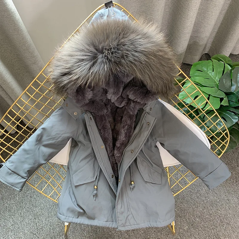 Парка зимняя со съемной подкладкой из кроличьего меха воротником енота TZ609 |