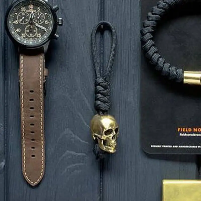 

Skeleton Skull Pendant Woven Rope Umbrella Mountaineer Survival Key Chain Unisex