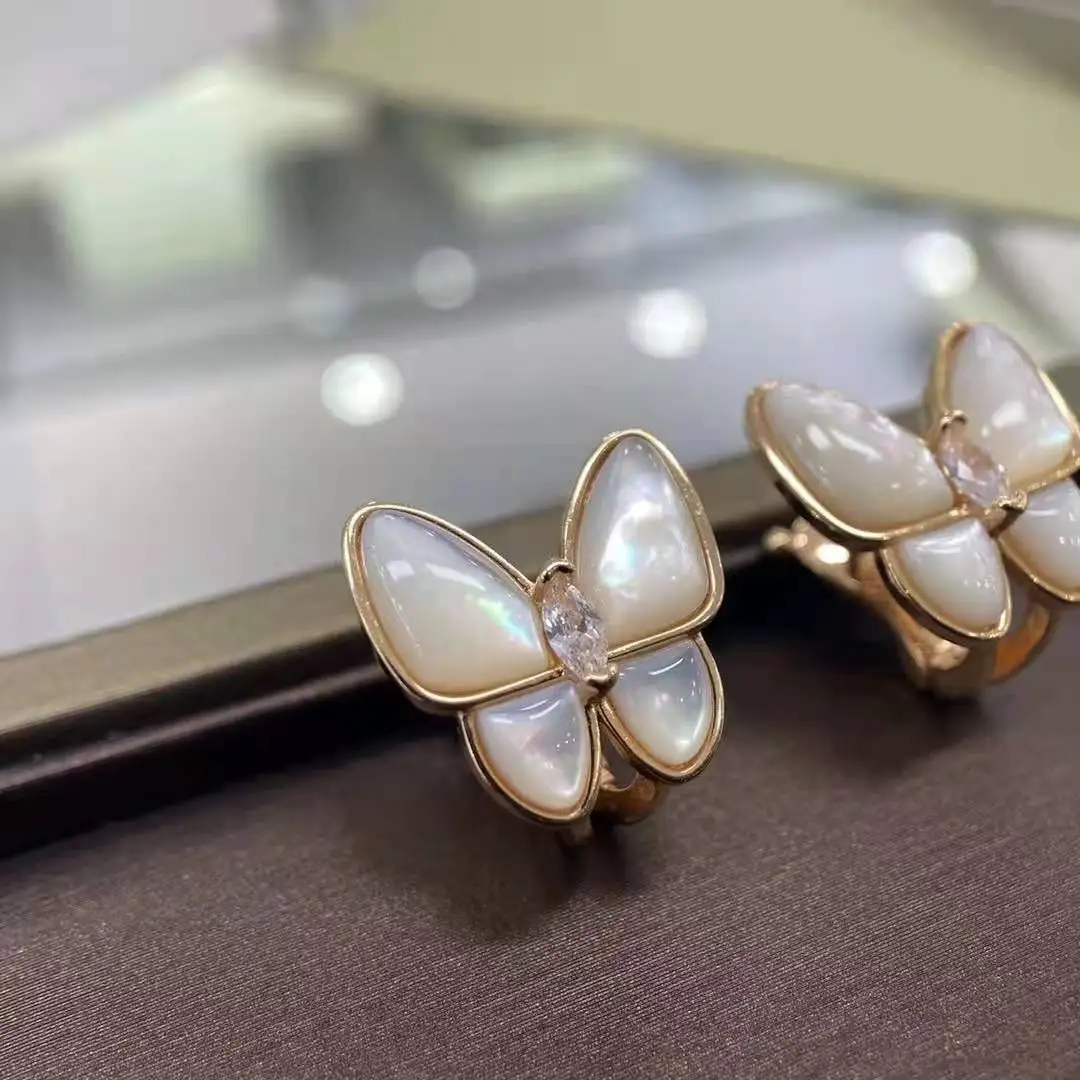 

Seiko S925 sterling silver natural white mother-of-pearl butterfly earrings temperament earrings