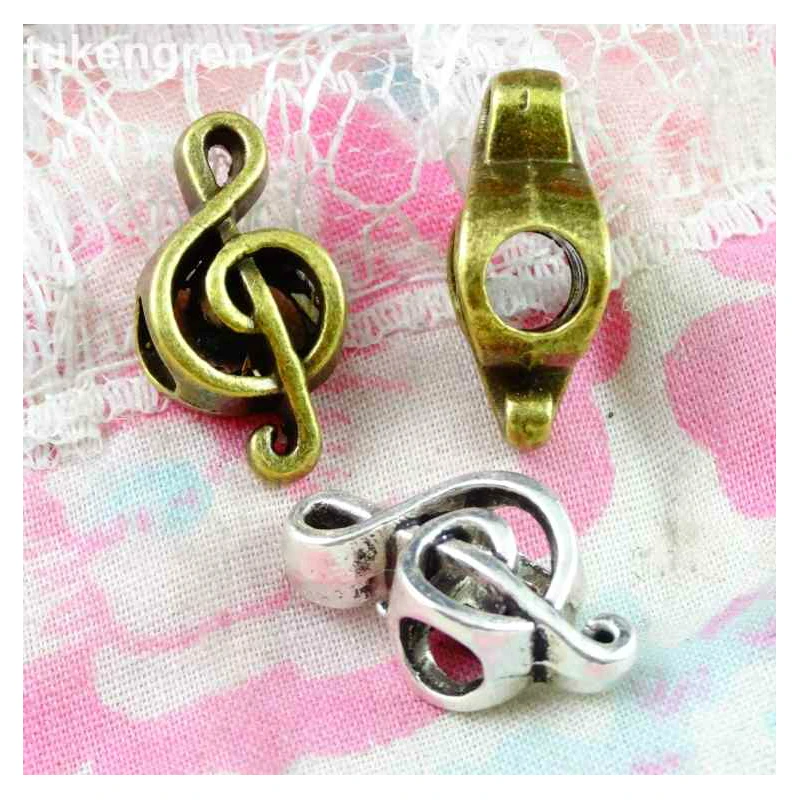 

50pcs/lot Zinc alloy bead Antique Bronze Plated Charms Pendants Fit Jewelry 18*9MM The music Fu perforated beads Shape