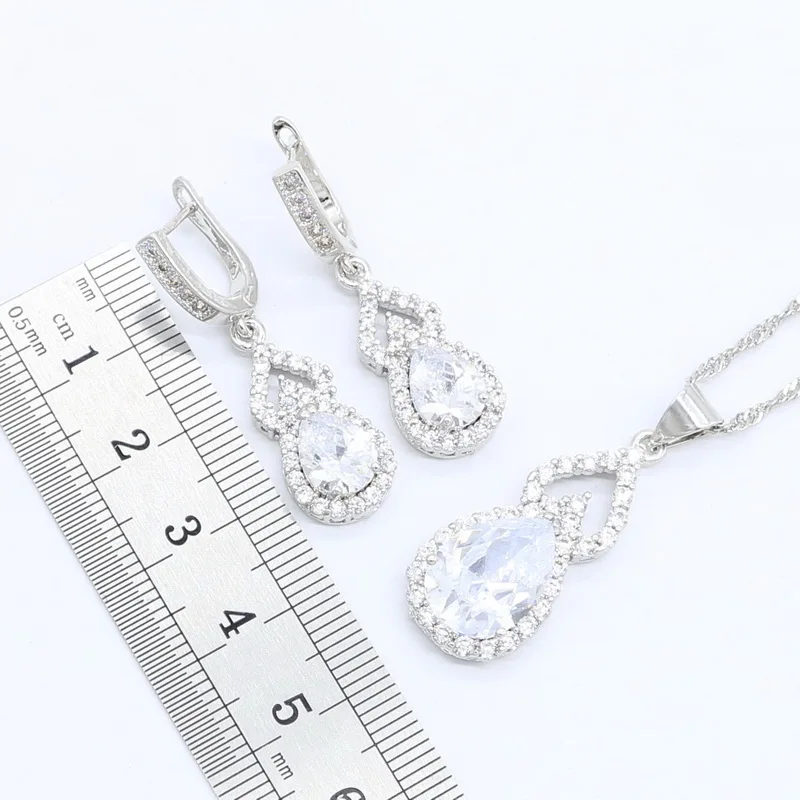 Комплект из кольца и сережек с цирконом серебристого цвета | Украшения