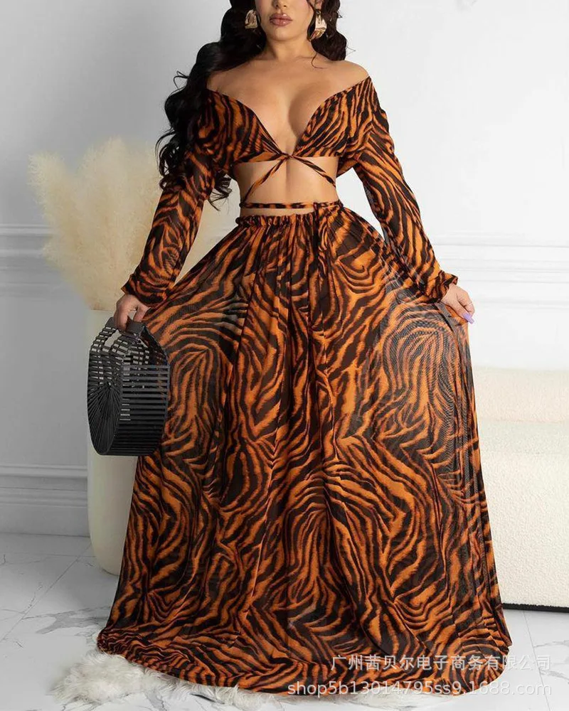

2021 women's printed 2 piece sets new V-neck long sleeve bandage Tops + large swing loose skirt suits