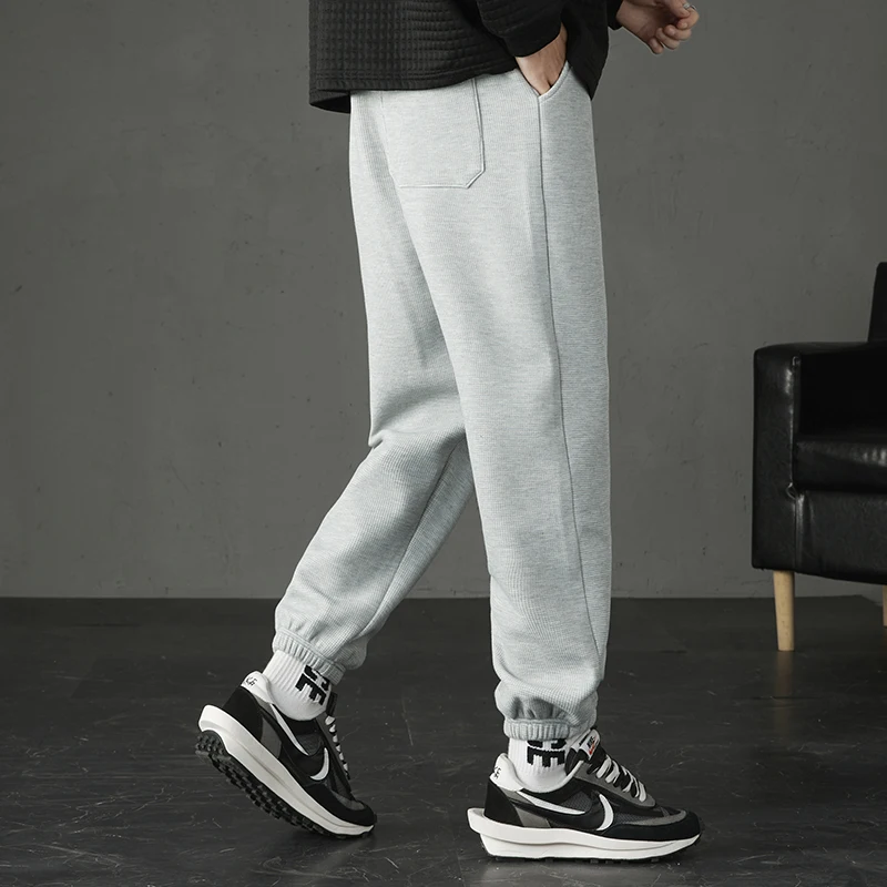 

[Pocket J] Autumn and Winter Men's Waffle Material Warm Feet Trousers Fashion Warm All-match Casual Pants