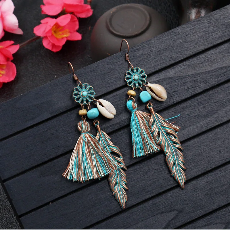 Синие серьги гвоздики с кисточками цветами перьями ракушками подвесками птицами