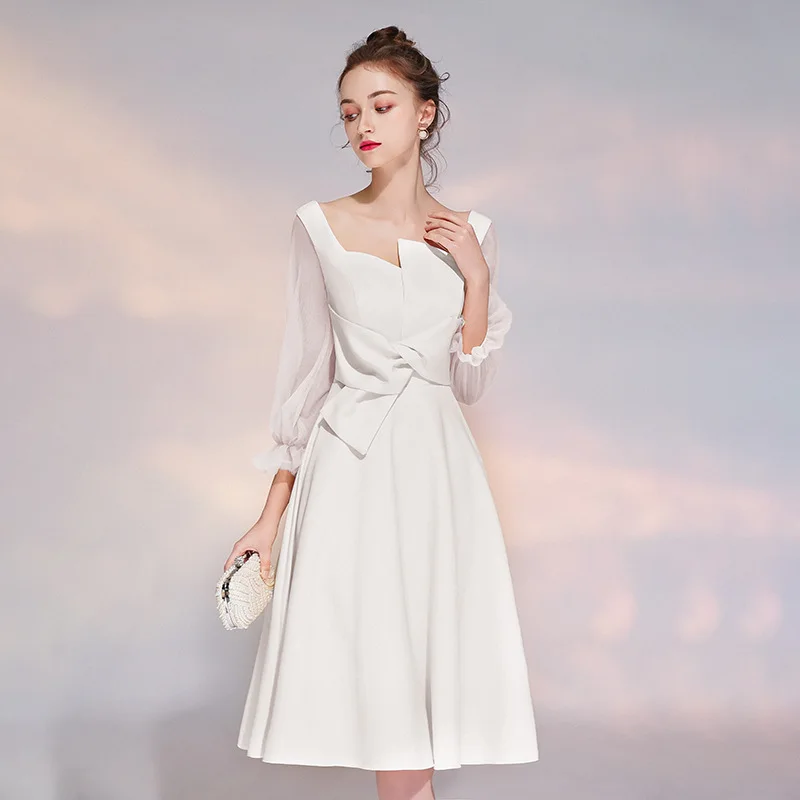 

Новое платье, маленькое платье, простое тонкое белое банкетное платье на бретелях, вечернее платье средней длины, официальное платье, женское элегантное атласное платье