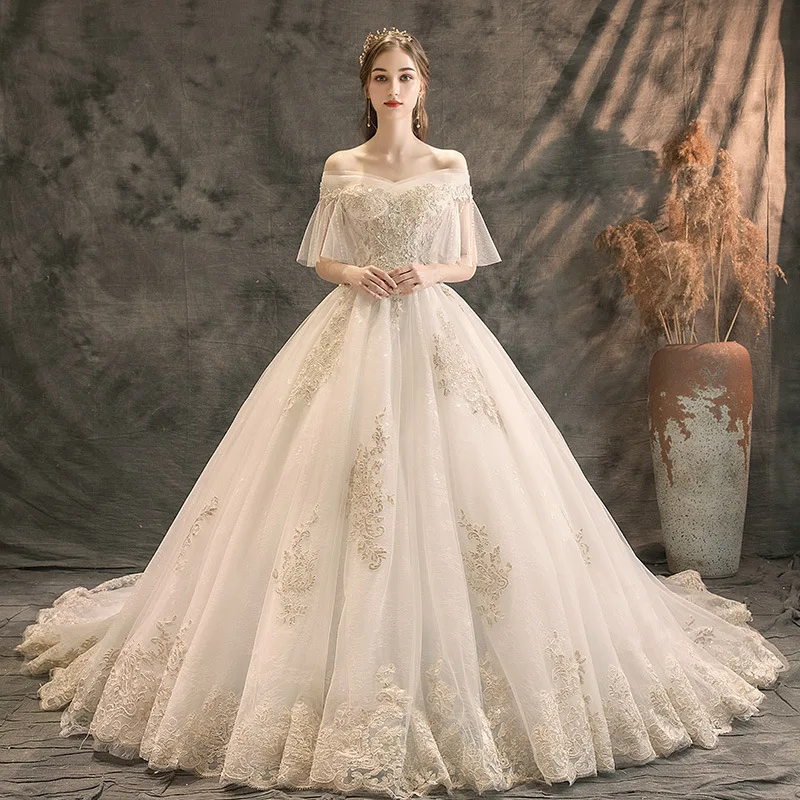 

New Appliques Lace Illusion Princess Ball Gown Wedding Dress Chapel Train Boat Neck Short Sleeves Vestido De Noiva Princesa