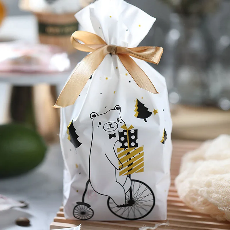

10Pcs/Set Christmas Themed Design Drawstring Candy Bag Gift Packing Bag Baking Cake Pouch (White Pink)