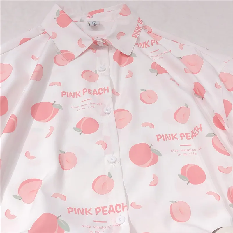 

Camiseta con estampado de melocoton rosa para mujer, blusa harajuku vintage kawaii de manga corta con cuello vuelto, 2021