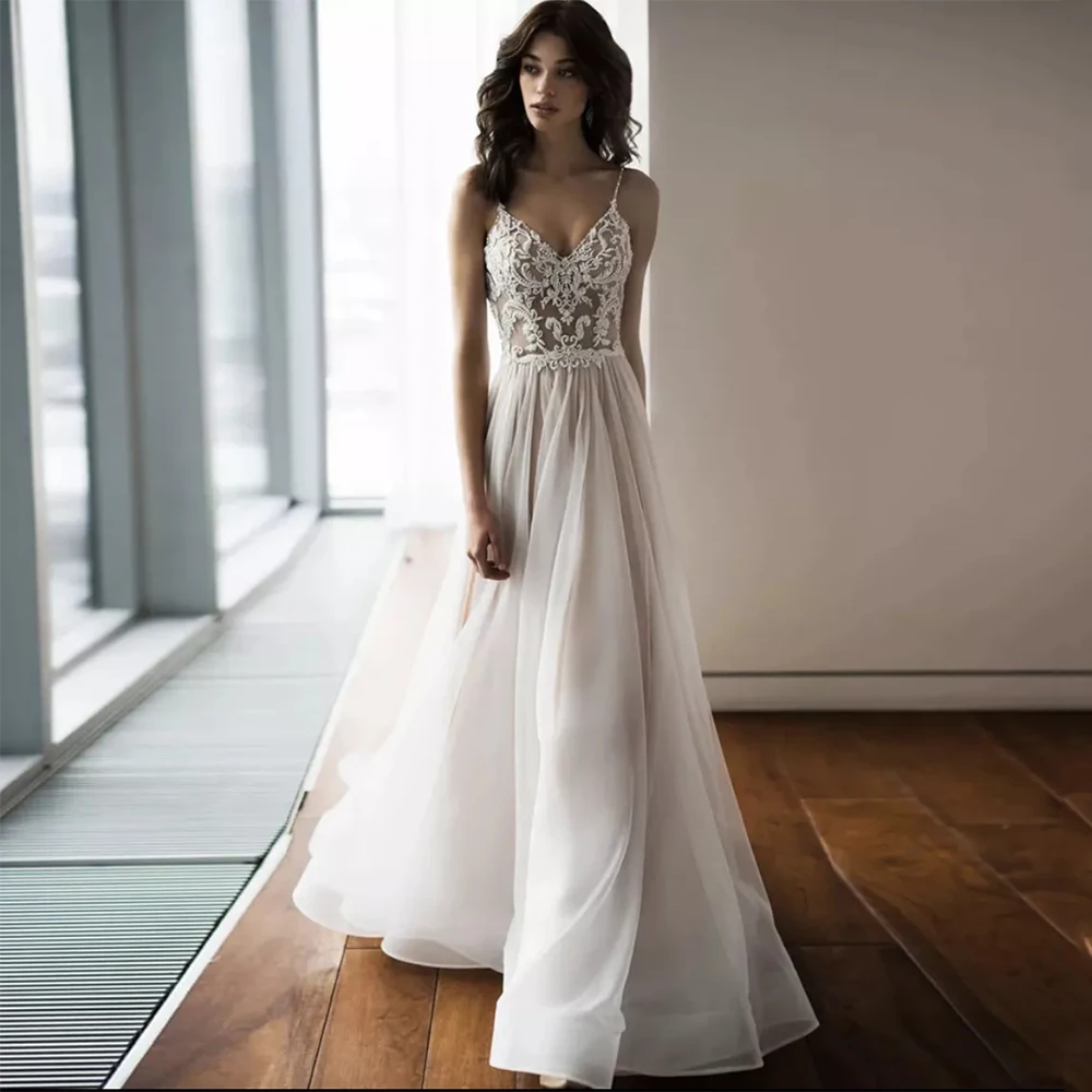 

Boho Wedding Dresses A Line Spaghetti Straps Lace Appliques Open Back Sleeveless Sweep Train Beach Bridal Gown Robe De Marie