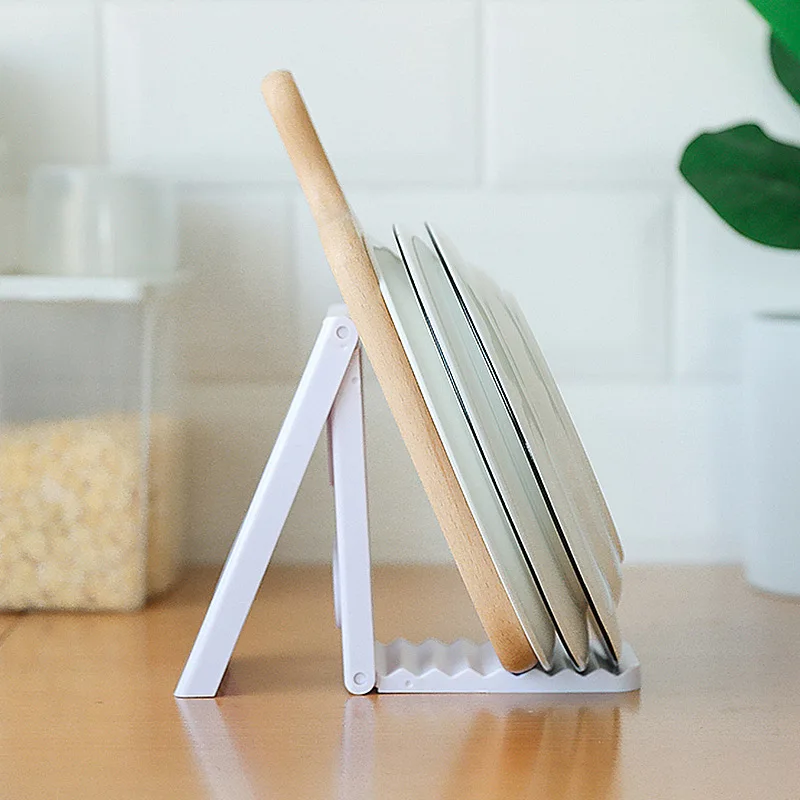 

Kitchen spatula rack to put pot cover sitting type cutting board cutting board storage rack Countertop foldable pot cover rack