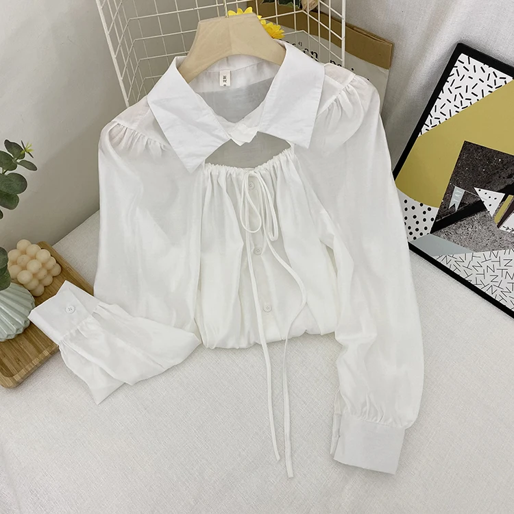 

Spring and summer 2021 new women's carefully machined hollow long-sleeved shirt fashion drawstring wide loose shirt top