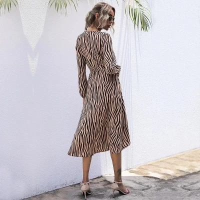 

2021 Spring and Autumn Women's New V-neck Temperament Commuter Long Sleeve Striped Tie Dress A-word Skirt