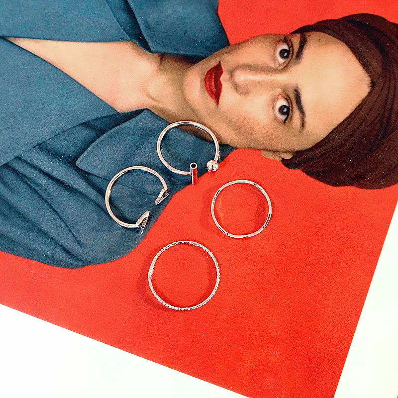 

Another Japanese and Korean personality simple fashion triangle geometry four-piece female students open ring joint ring jewelry