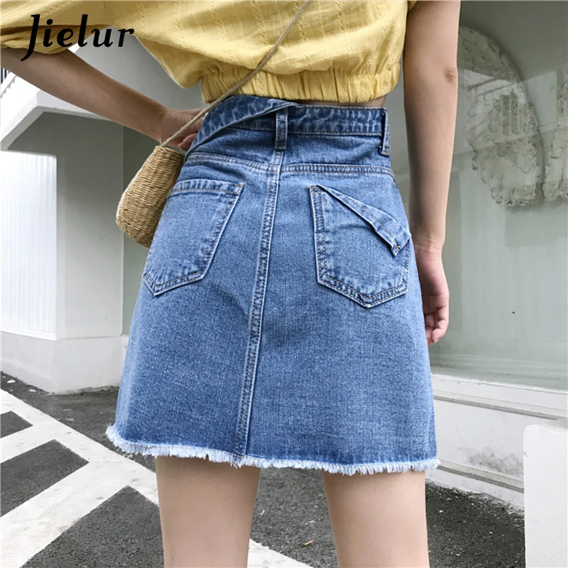 

Jielur Irregular Summer Denim Skirts Womens 2020 Mini Skirt New Solid Color High Waist Button Pocket Blue Jupe Femme Slim Skirt