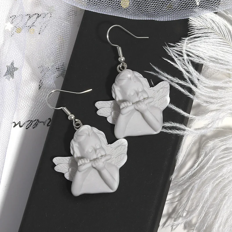 

Japanese Fashion Cute Cupid Archery Angel Plaster Asymmetric Earrings Funny and Interesting Ear Clips Modern Women Jewelry
