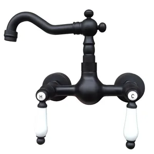 black oil rubbed brass bathroom kitchen sink basin faucet mixer tap swivel spout wall mounted dual ceramic handles mnf522 free global shipping