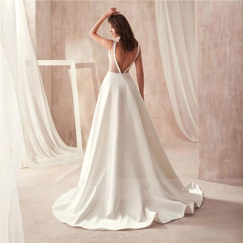 Женское атласное свадебное платье с карманами черное V-образным вырезом разрезом