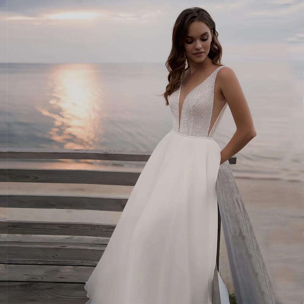 

Великолепное Тюлевое кружевное пляжное свадебное платье цвета слоновой кости со шлейфом и аппликацией, пикантное белое платье невесты с ру...