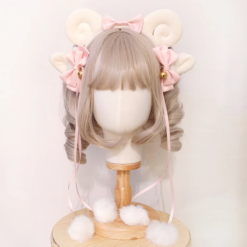 

Повязка на голову с бантом из овечьего рога