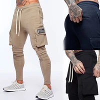 2021 new muscle fitness sports leisure trousers mens running training loose and breathable large size pants sweatpants cargo