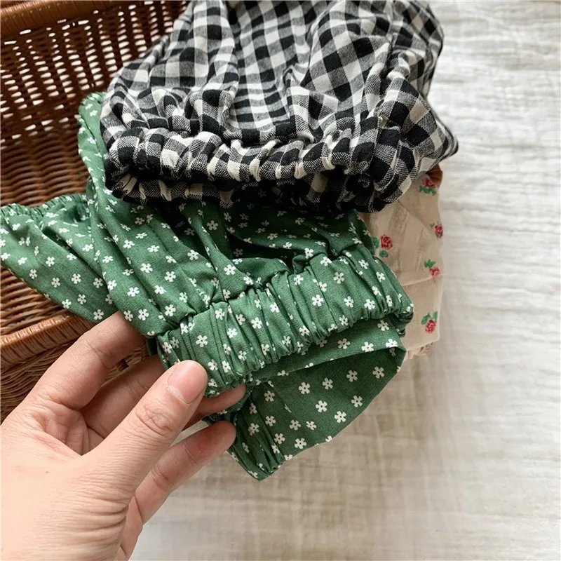 

Children's summer models girls floral shorts big pp pants baby girl plaid pants pants fresh bread shorts