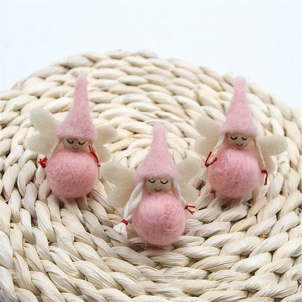 

Рождественская кукла из шерстяного фетра