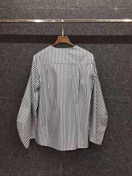 

2021 early spring new women's V-neck stripe decoration irregular long sleeve versatile shirt 303