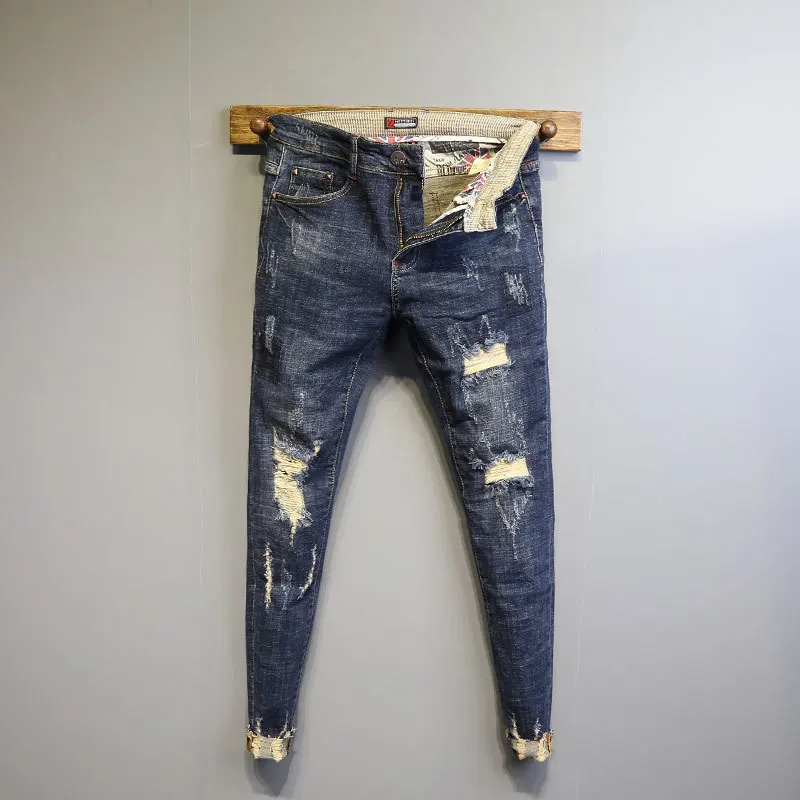

Модные голубые потертые рваные джинсы 2021 с кошачьей бородой потертые зауженные джинсы для мужчин и молодежи универсальные душевые брюки-ка...