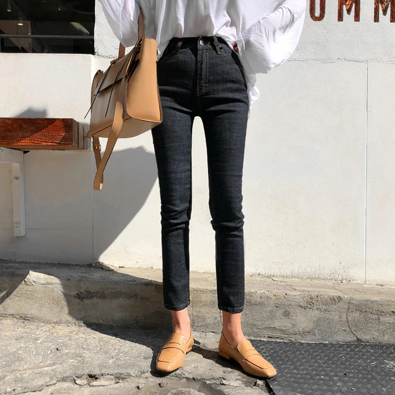 Женские джинсы с разрезом сбоку Mozuleva черные повседневные Стрейчевые высокой