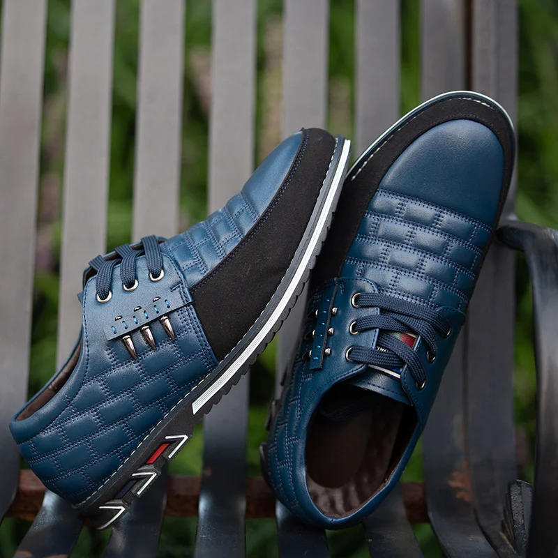 Мужские повседневные кожаные кроссовки темно-синие удобные на плоской подошве