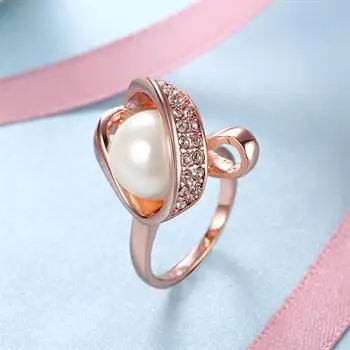 

Rose Gold Fancy Setting Round Pearl Ring R160 LKN18KRGPR510