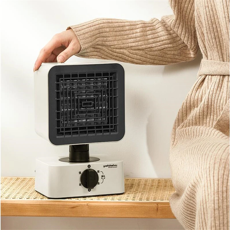 

220V Mini Portable Electric Heater Desktop Mini Electric Fan Heater Easy To Operate Height Adjustable