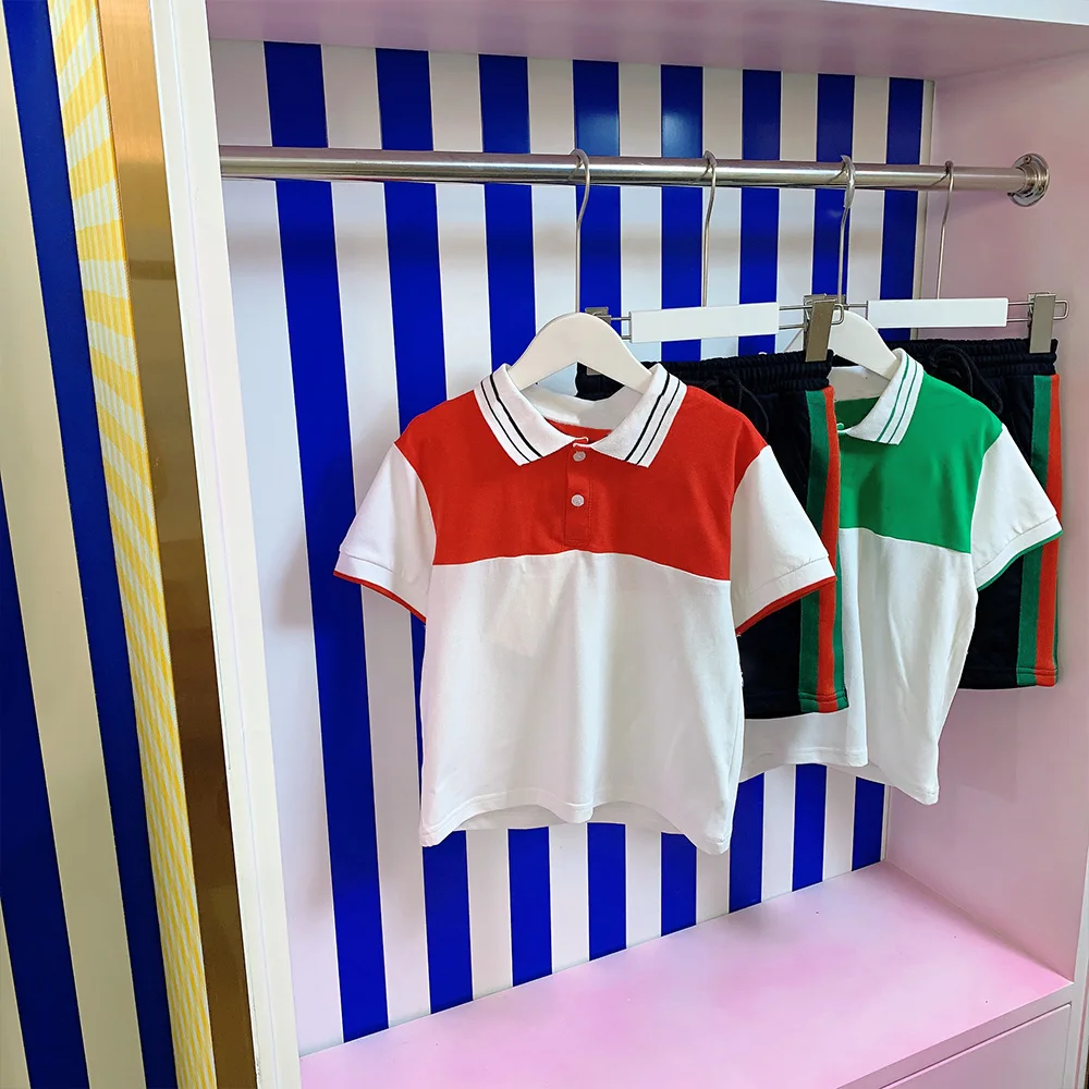 

Брендовый дизайнерский детский летний детский костюм топ с коротким рукавом и воротником-рубашкой для мальчиков и девочек + повседневные с...