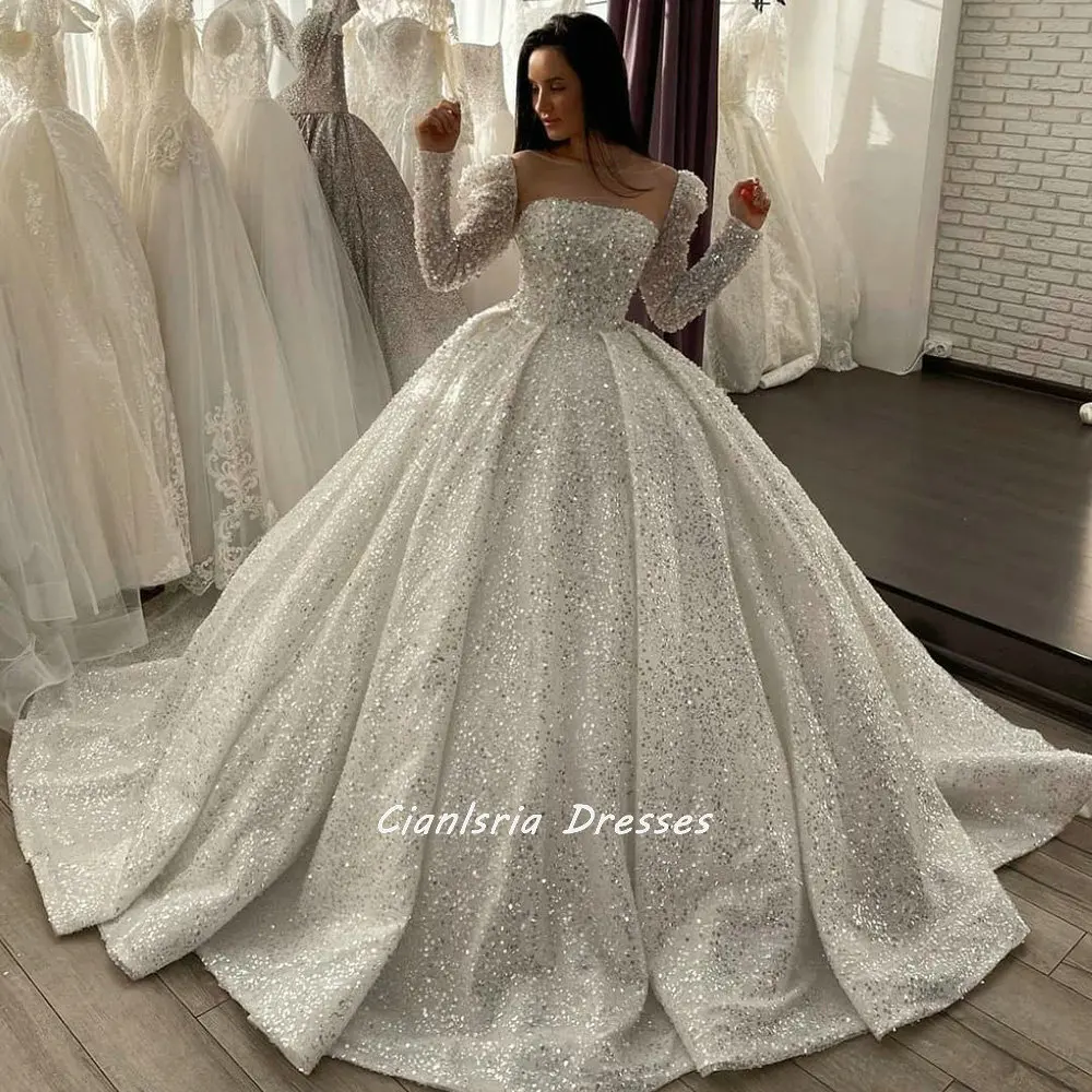 

Luxurious Pearls Sequined Long Sleeve Dubai Ball Gown Wedding Dresses Illusion Scoop Crystal Saudi Arabic Bridal Gowns