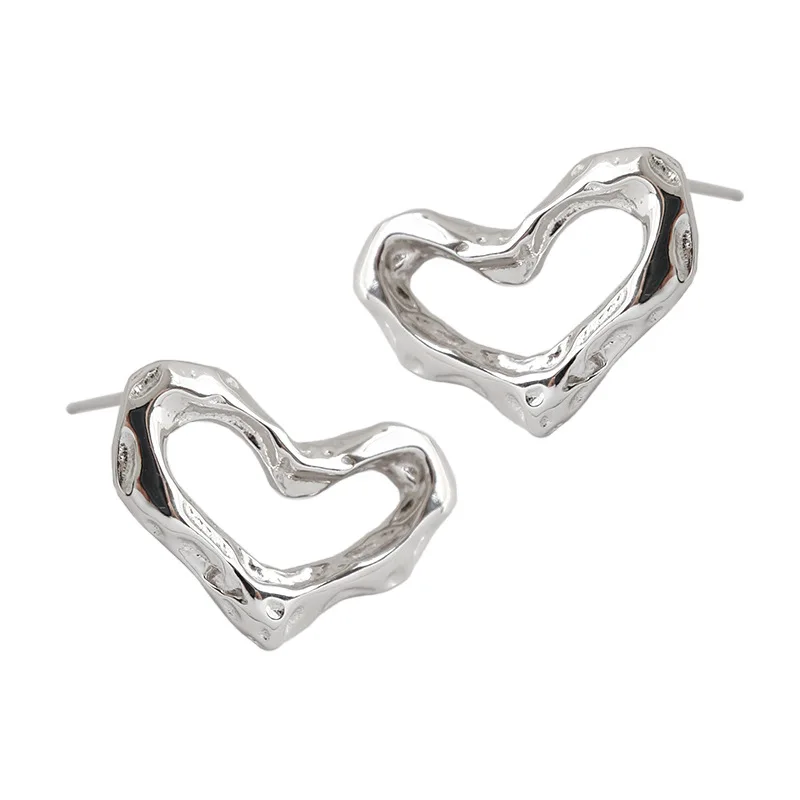 

CH-1070 Korean version of S925 sterling silver earrings ins irregular concave and convex surface love heart-shaped earrings