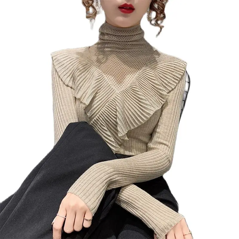 

Женский трикотажный свитер с воротником-стойкой и внутренним слоем