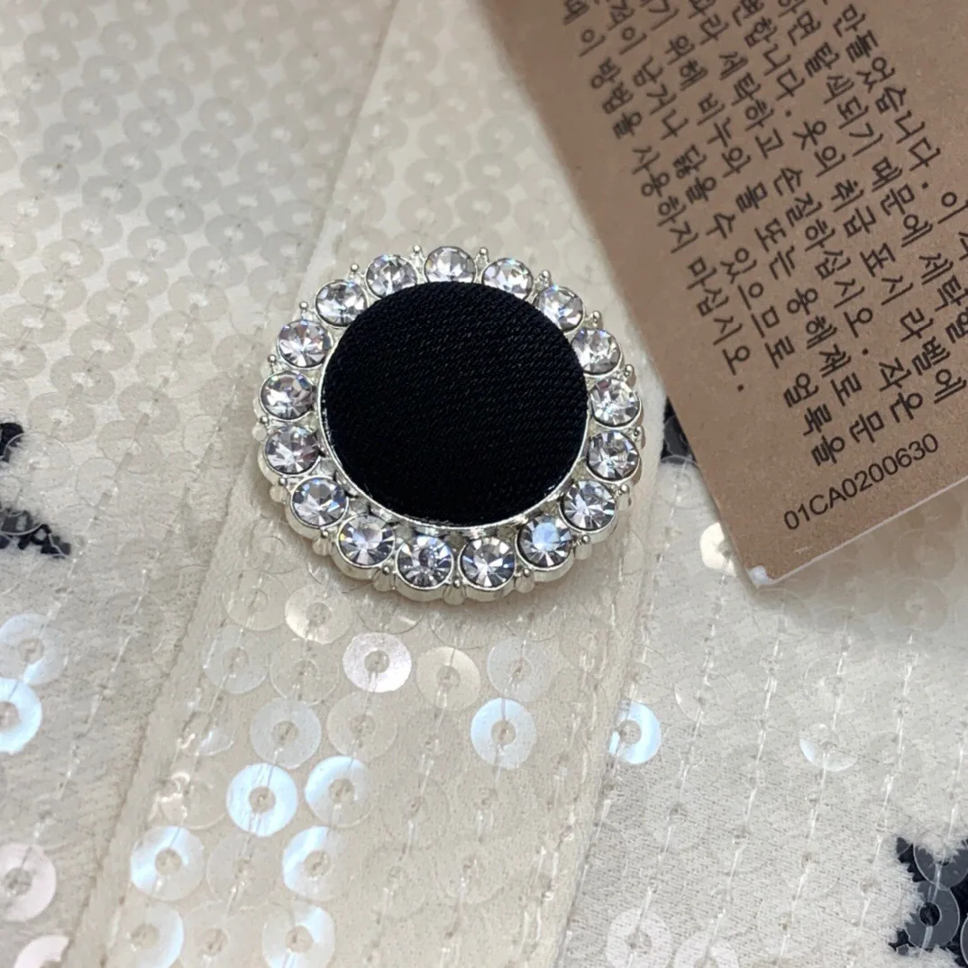 

High Quality Spring and Summer New Temperament Doll Collar Sequins Heavy Embroidery Pattern Stitching Long-sleeved A-line Dress