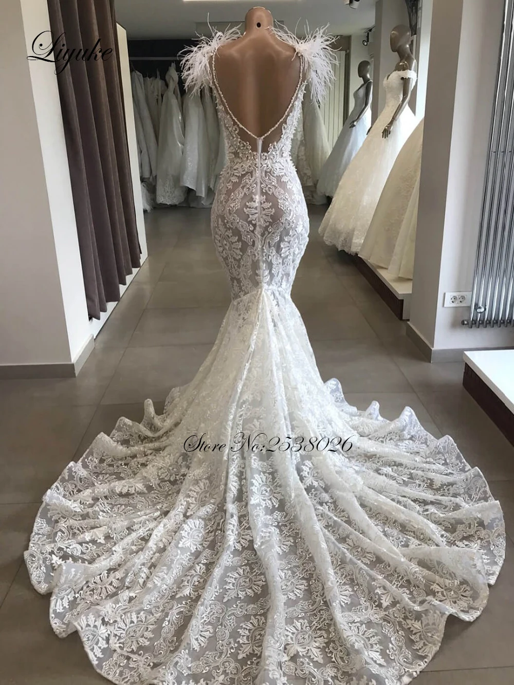 

Liyuke Luxury Ostrich Feather Mermaid Wedding Dress Scoop Neckline With Sleeveless Chaple Train Bridal Dress