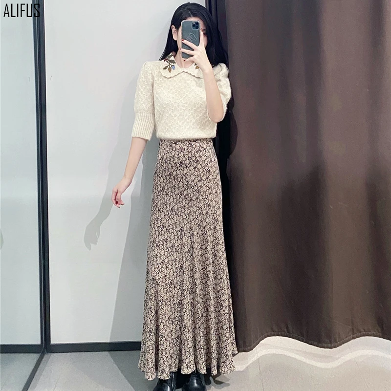 

Autumn new women's A-line skirt temperament commuter mid-length skirt Korean fashion all-match floral print skirt