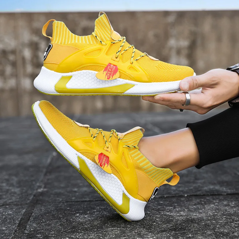 

Men's shoes new 2021 Korean version of the trend of sports shoes student running shoes comfortable needle flying knit men's