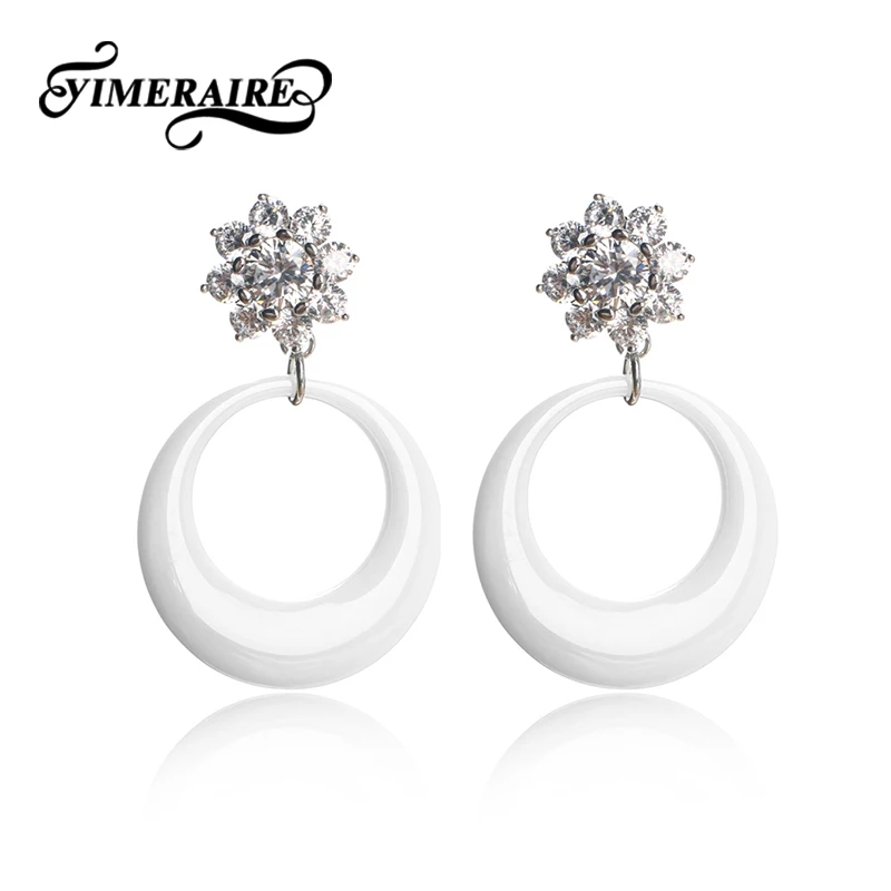 Женские серьги гвоздики TUHE черные и белые керамические овальные с кристаллами