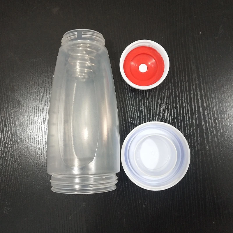 

Hand Shake Batter Dispenser Bottle with Wire BlenderBall Food-Grade PP Heat Resistance Easy to Use for Kitchen ANDF889