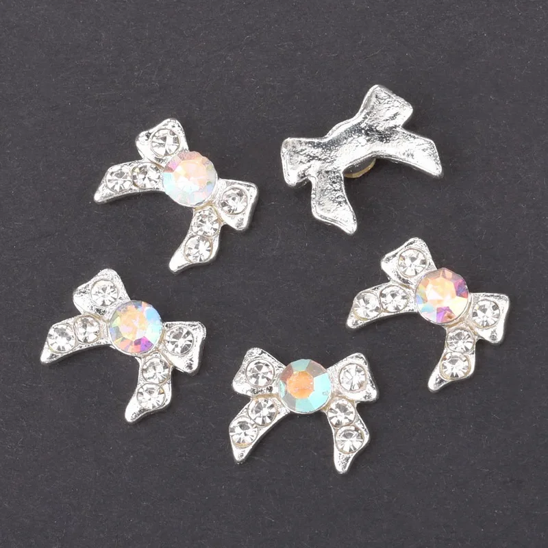 10pcs Strass 3d Nail Bow Tie AB White Rhinestone Pearl Design Nail Art Decoration Glamour Silver Alloy Jewelry Nail QB028-029