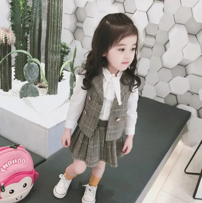 

Brand high-quality girls' vest + temperament bottoming shirt + skirt Kids fashion suit set