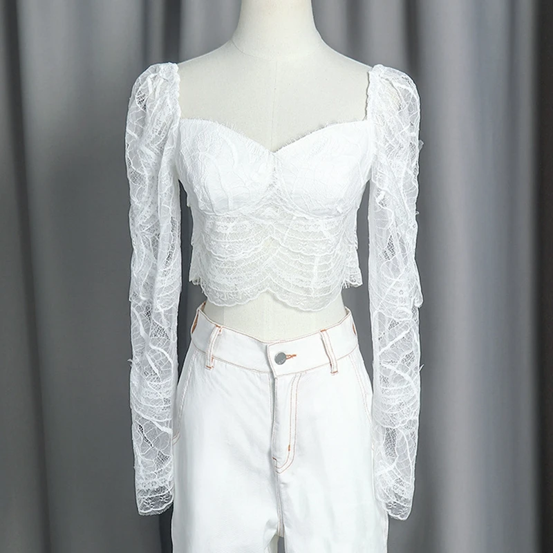 

Woman White Lace Crop Tops 2021