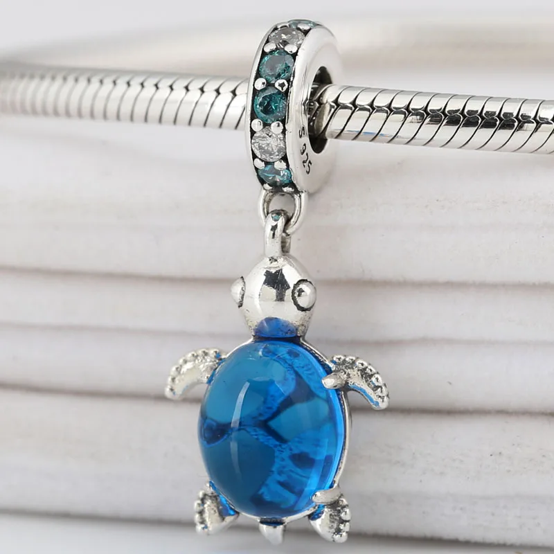 

Подвеска из серебра 925 пробы в виде павлина и морской черепахи