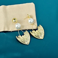 korean version of the trendy cool metal texture pearl womens earrings long tassel temperament 925 silver needle womens earring