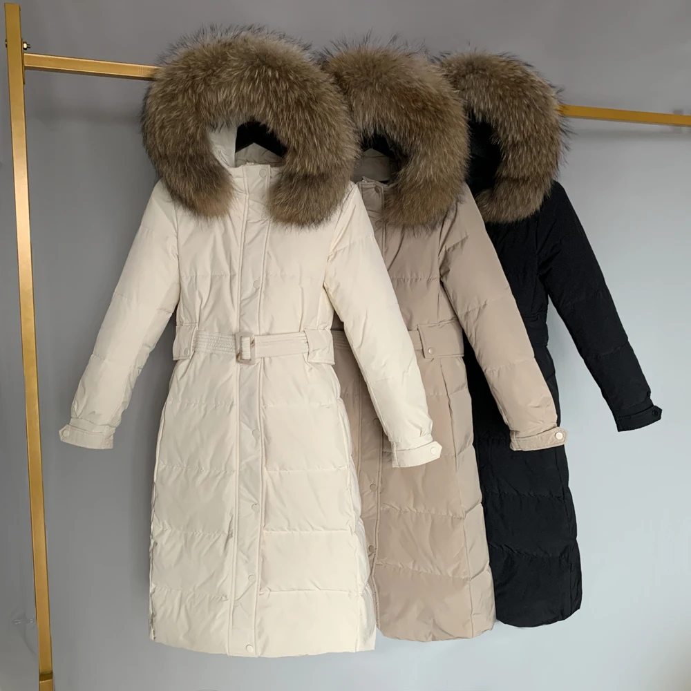 

Women 90% White Duck Down Coat Large Natural Raccoon Fur Long Down Jacket Loose Hooded Thick Parkas Female Overcoat With Belt