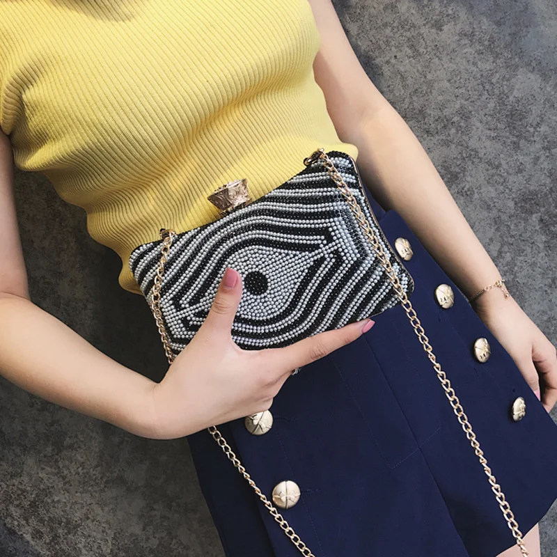 

Hand Bag Women's New Women's Leisure Diamond Inlaid Creative Eye Pearl Decorative Chain Messenger Bag