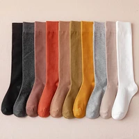 womens calf socks womens black and white stockings solid color pressure stovepipe socks cotton simple high stockings